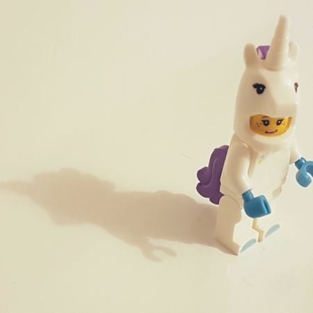 Lego minifig in unicorn costume. Image from Ines Pimentel | unsplash.com